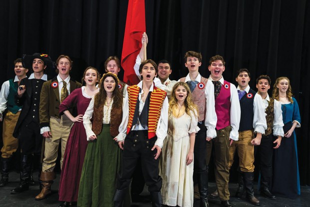 Members of the cast of Houston Christian High School’s production of Les Misérables