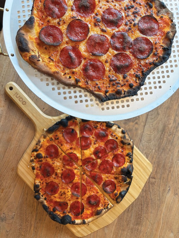 Store-bought pizza dough versus homemade, both with pepperoni.