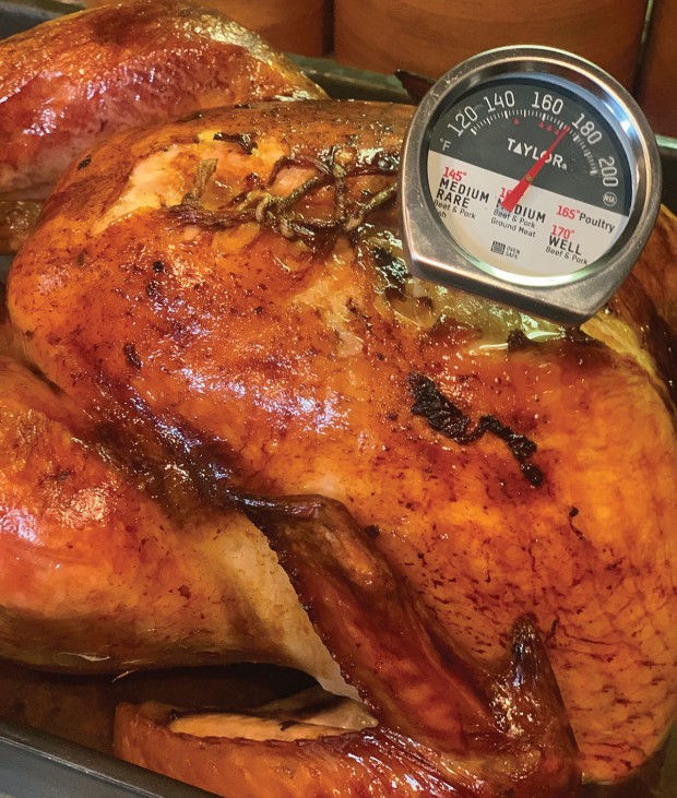 A turkey brined with apples and oranges.