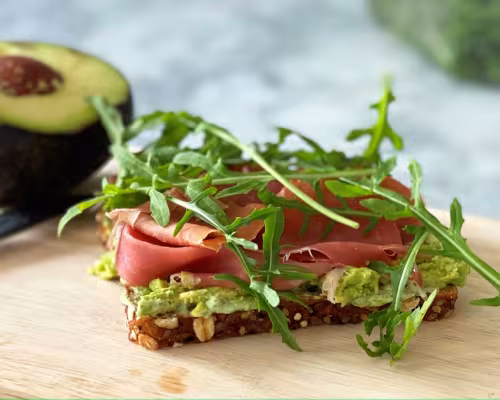 Avocado, Prosciutto, Pesto, and Arugula Open-Faced Sandwich