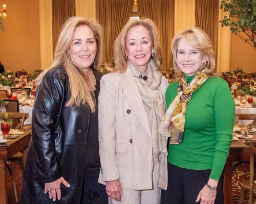 Executive director Jennifer Boubel, guest speaker Kreis Beall, and board president Kirsten Herrscher