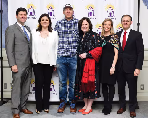 Charlie and Susan Neuhaus, Bode Miller, executive director Mary Beth Staine, and Kate and Logan Walters