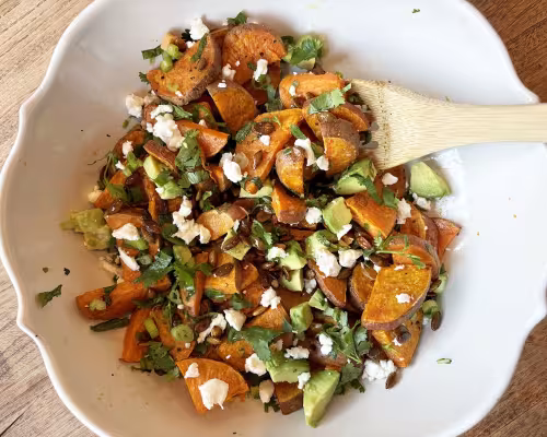 Sweet Potatoes with Warm Pepita Dressing and Goat Cheese