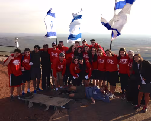 From left, top row: Rabbi Aharoni Carmel, Ari Hoffman, Hersh Bootin, Mecah Levy; middle row: Zevy Yanowitz, Brett Kleinman, Slavador Bentolila, Josh Pershel, Roni Buchine, Eisheva Teigman, Raizel Adler, Lauren Mueller, Shirley Lipski, Melissa Stock, Re