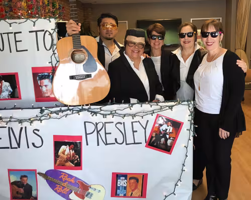Amazing Place staff celebrating Elvis