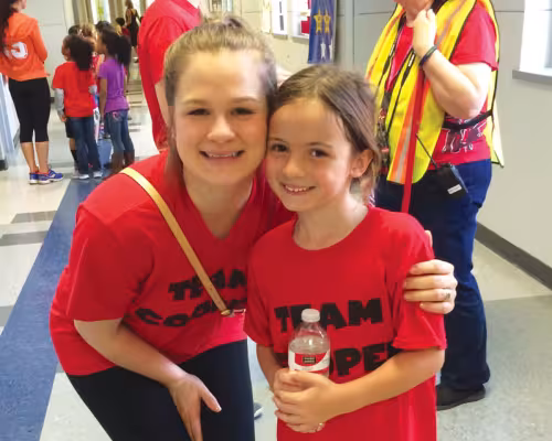 Tricia Garrison, Trinity El-Hakam