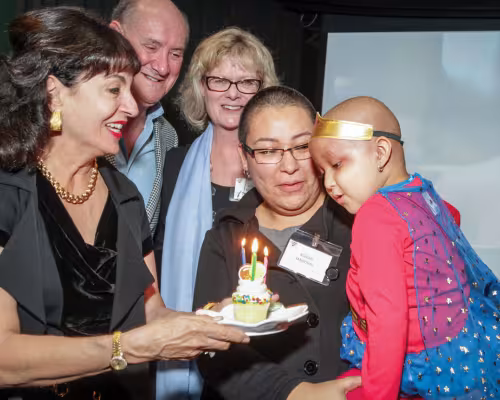 Mady and Ken Kades, Leslie Bourne (RMH Houston CEO) and Rossio Sandoval with her daughter Sophia