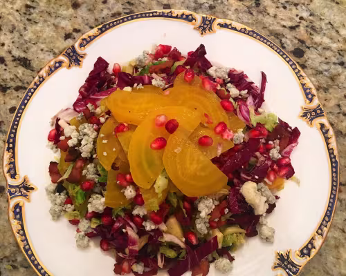 Shaved Brussels Sprouts and Beet Salad with Bleu Cheese Crumbles and Pomegranate,